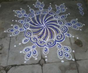 Rangoli: Vibrant blue kolam!